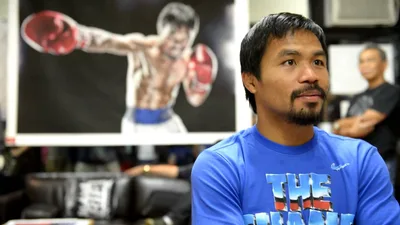 Boxeador cristão exorta repórter ateu após entrevista: "Há um Deus"