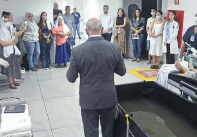 Paciente terminal é batizado em piscina improvisada em hospital no MS