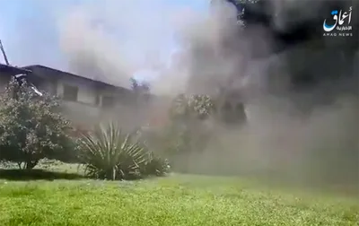 New video shows Islamic militants smashing statues, torching church