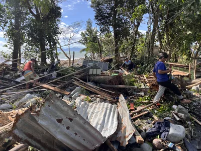 Philippines digs out from Typhoon Fung-wong as death toll climbs to 18