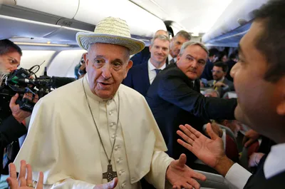 Pope tells French reporter he’s honored by attacks on his ministry