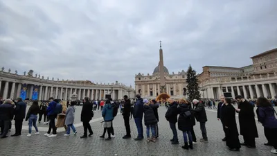 ‘We love Benedict’: Catholics flock to the Vatican to say goodbye to Benedict XVI