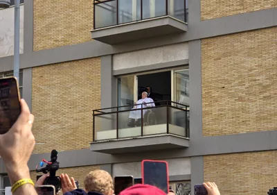 Blessing the crowd outside Gemelli Hospital, Pope Francis makes first public appearance in weeks