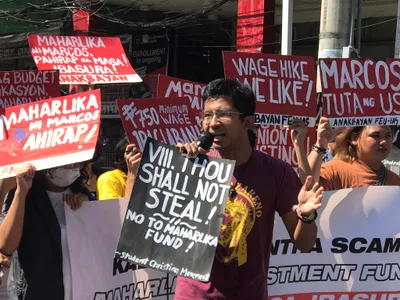 Youth group hits signing of investment fund into law