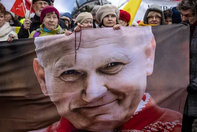 Demonstrators in Poland defend late pope John Paul II