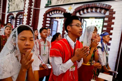 Pope, as ‘grandfather,’ urges Myanmar’s young to love and serve