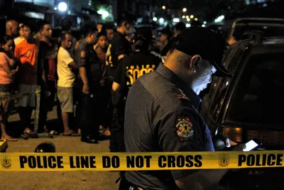 Three police officers surrender over killing of Spanish man