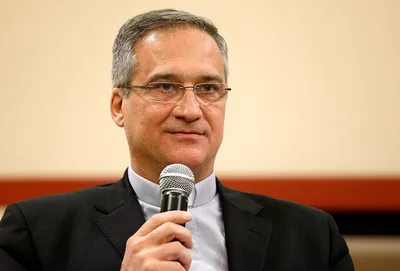 Pope accepts resignation of communications prefect
