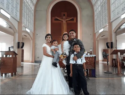 Civil-wed couple tie knot in church after 10 years