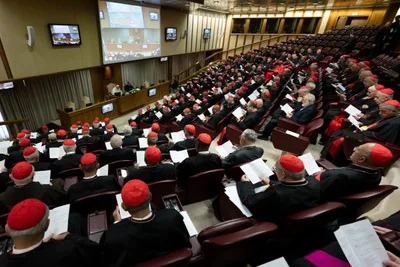 197 cardinals meet behind closed doors — but what is being discussed?