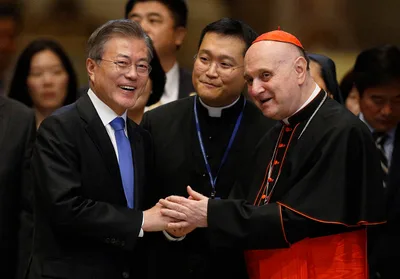 Pope, meeting South Korean leader, says he’s open to visiting North