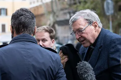 Cardinal Pell arrives in Rome as financial scandal casts shadow over Vatican