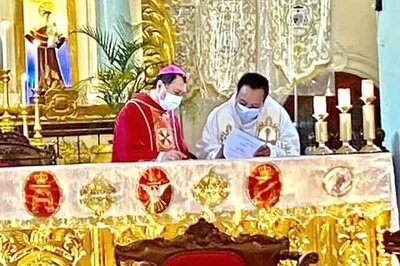 Bishop Mayugba installs new rector of Badoc Basilica