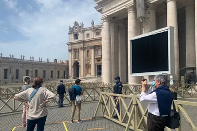 Catholics rejoice as public Masses resume in Rome with safety precautions