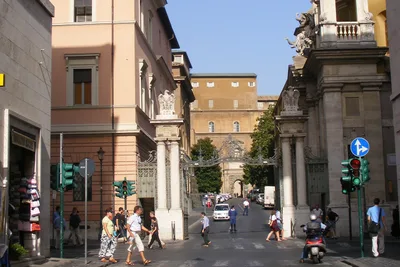 Guard opens fire as man drives car into Vatican; suspect in custody