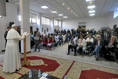 Pope Francis to migrants: The Church suffers with you
