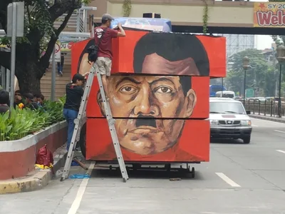 Protests, counter-protests mark martial law anniversary