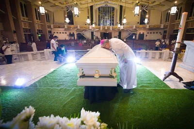 LOOK: Remains of Archbishop Cruz arrive in Dagupan cathedral