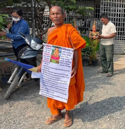Defrocked Cambodian monk flees to Thailand, resumes religious life there