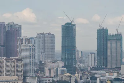 Corruption scandal, climate disruptions drag Philippine growth to 14-year low
