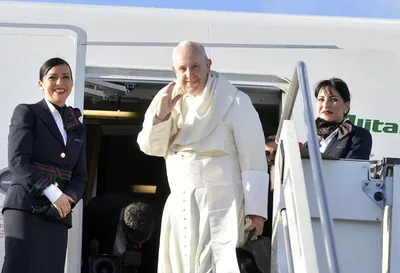 On flight to Panama, Pope confirms November trip to Japan