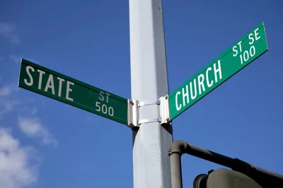 What is the role of the Church in the political world?