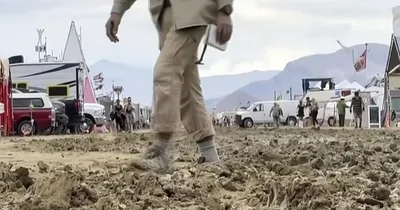 Rain leaves Burning Man attendees stuck in the mud