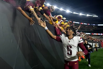 Jayden Daniels Puts 'trust in the Lord God,' Leads Washington to First Playoff Win in 19 Years