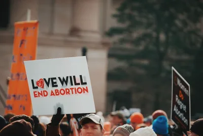 Why Trump has delighted pro-lifers across the world: the President's rapid series of measures ...