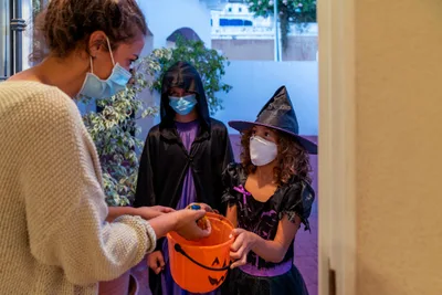 Churches hand out thousands of pounds of candy on Halloween while others decry 'pagan' holiday