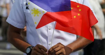 Philippines, China agree to de-escalate South China Sea tensions