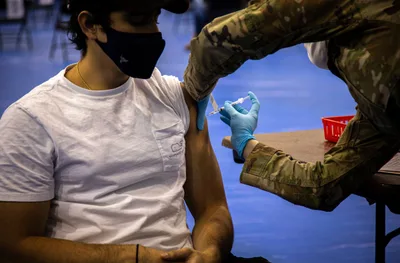 COVID-19 booster shots to be required at some Catholic colleges next year