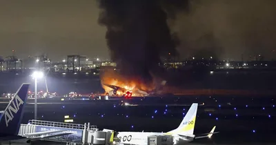Five killed, hundreds evacuated after planes collide at Japanese airport