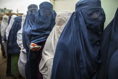 Taliban criticized for ordering women to cover faces in public, other restrictive edicts
