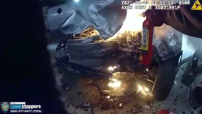 'Seconds Matter': Nail-Biting Bodycam Video Captures Quick-Thinking Cops Rescuing Driver From Car 'Engulfed in Flames'