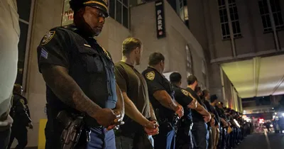 Gunman who killed four planned to hit NFL office, mayor says