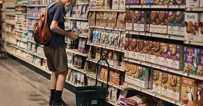 Economy shrinks, Fed raises rates