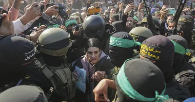 Chaos at Hostage Release Prompts Israel to Pause Exchange