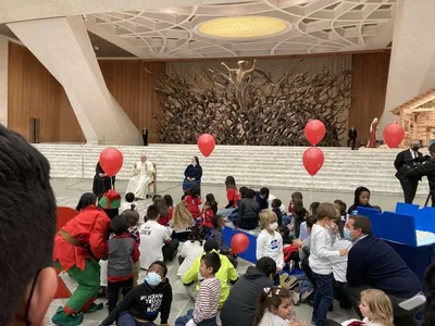 Pope Francis’ 85th birthday party included lots of kids and cake