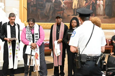 Rev. William Barber Arrested in Capitol Rotunda after Praying against Republican-Led Budget