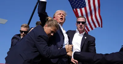 Trump rushed off stage after shots fired at rally