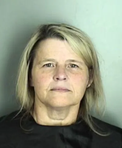 Woman arrested for allegedly embezzling over $400K from church charged with tax evasion