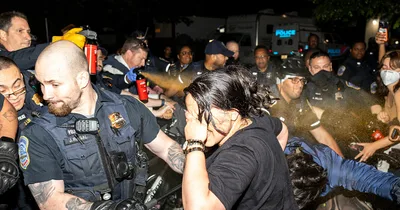 Police arrest protesters, demolish encampment at university in Washington