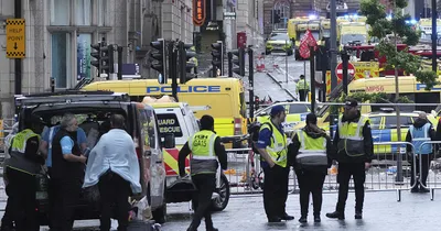 Police in Liverpool rule out terrorism after car rams into crowd at parade