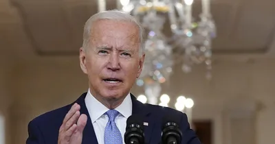 With Americans still in Afghanistan, Biden claims success