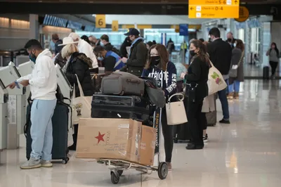 Holiday Travel Nightmare Ensues as Airlines Cancel Thousands of Flights Due to COVID