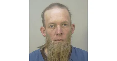 Wisconsin police criminally charge father of Christian school shooter