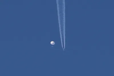 US Downs Chinese Balloon Over Ocean, Moves to Recover Debris