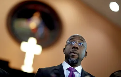 Walker, Warnock Offer Clashing Religious Messages in Georgia