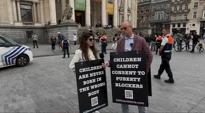 Belgian Police Arrest, Strip Search Billboard Chris, ADF Staffer for Holding Signs Defending Kids